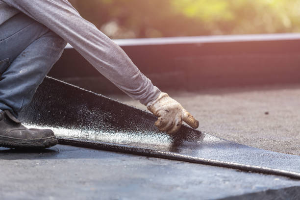 Professional Basement Waterproofing technician working in Sheboygan Falls, WI